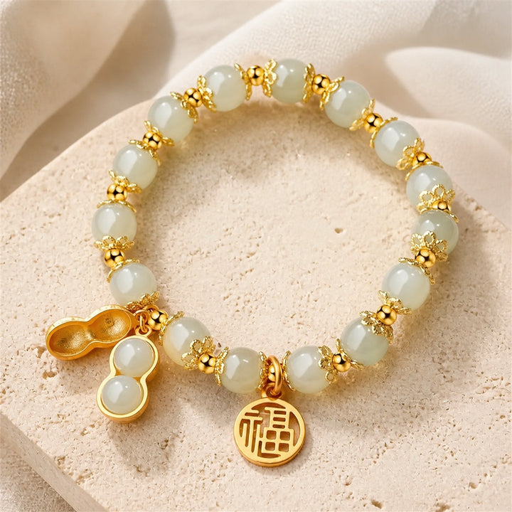 Bracelet en or avec des perles de jade