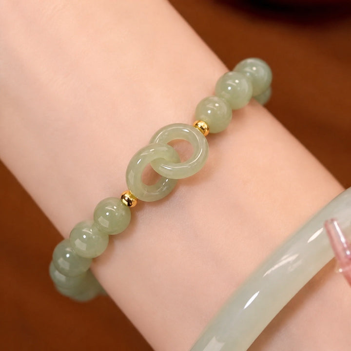 Bracelet en Perles de Jade Infini avec Charme