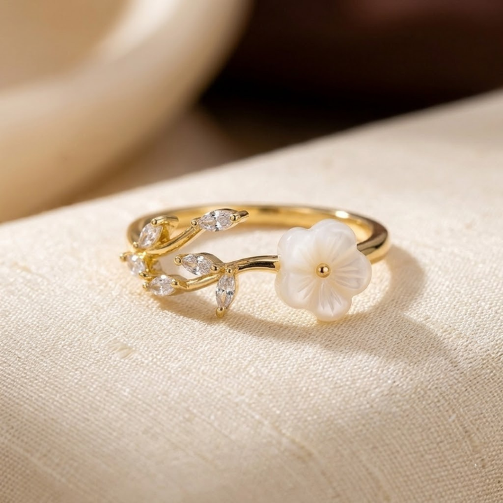 Open gold ring with flowers and leaves