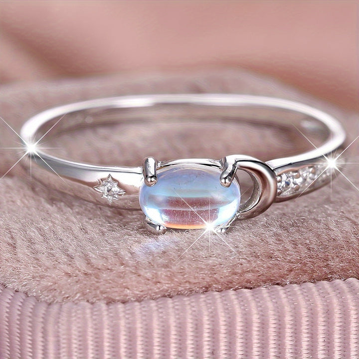 Bague en argent en forme de croissant avec pierre de lune