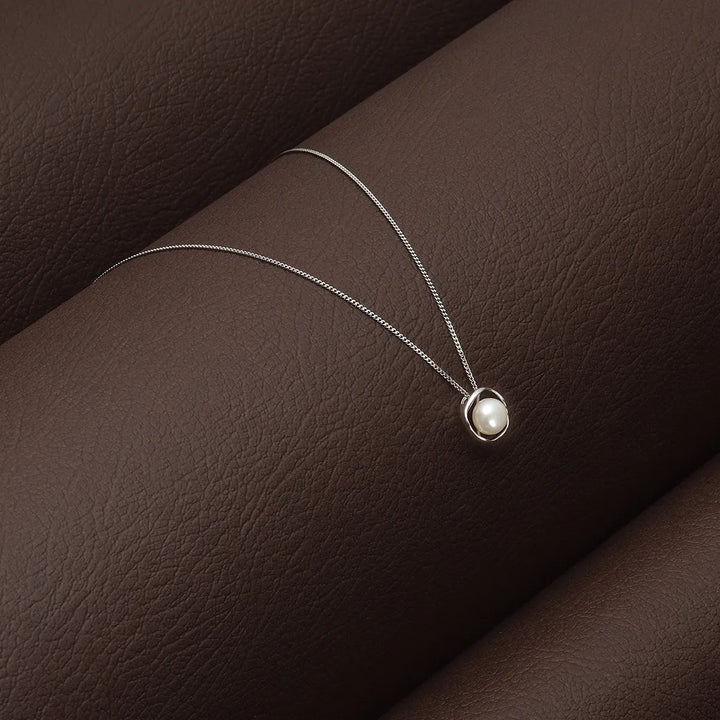 Pendentif Minimaliste à Perle Flottante