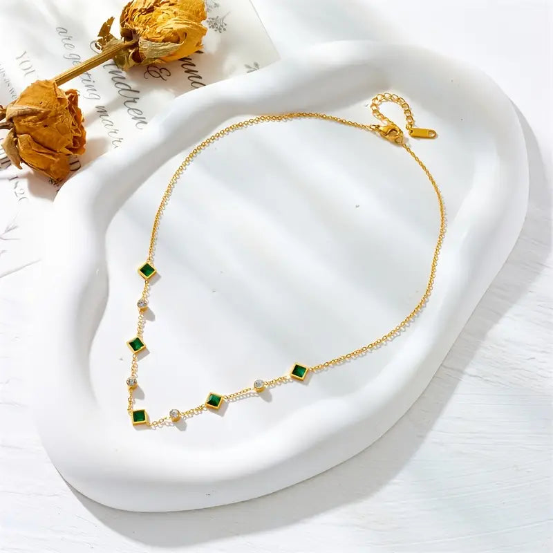 Collier géométrique en or et émeraude