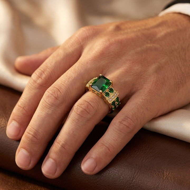 Geometric ring in gold and emerald