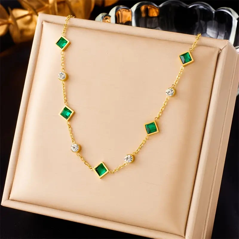 Collier géométrique en or et émeraude