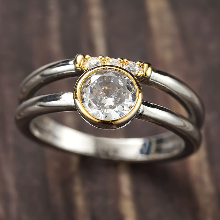 Bague en zirconium avec incrustation en or radieux