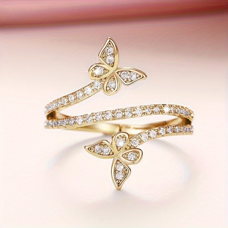 Bague en or blanc avec papillon en zirconia incrusté