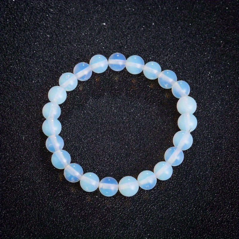 Bracelet minimaliste en perles de pierre de lune éclatantes