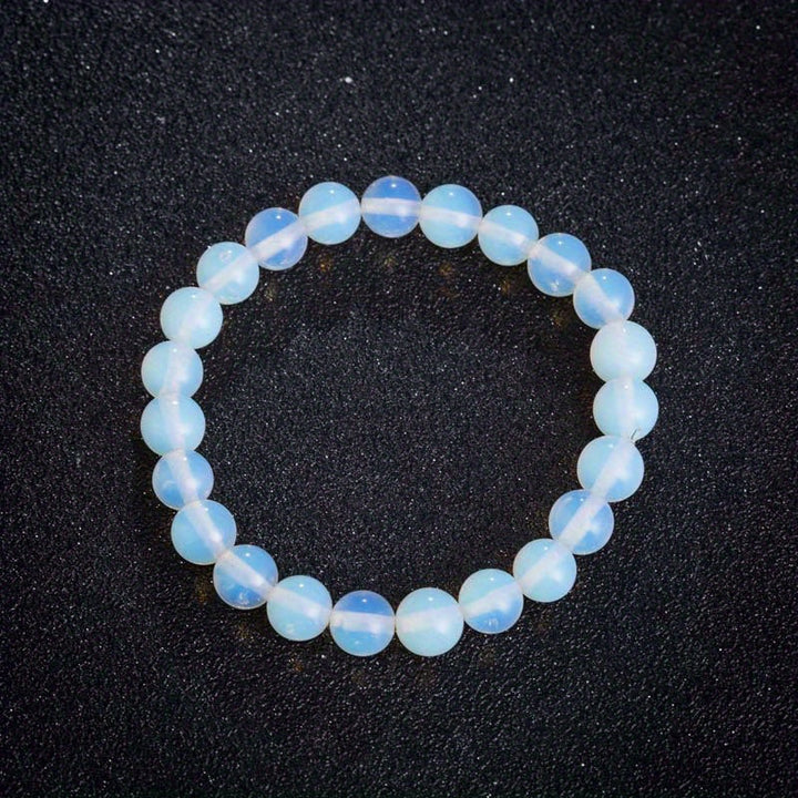 Bracelet minimaliste en perles de pierre de lune éclatantes