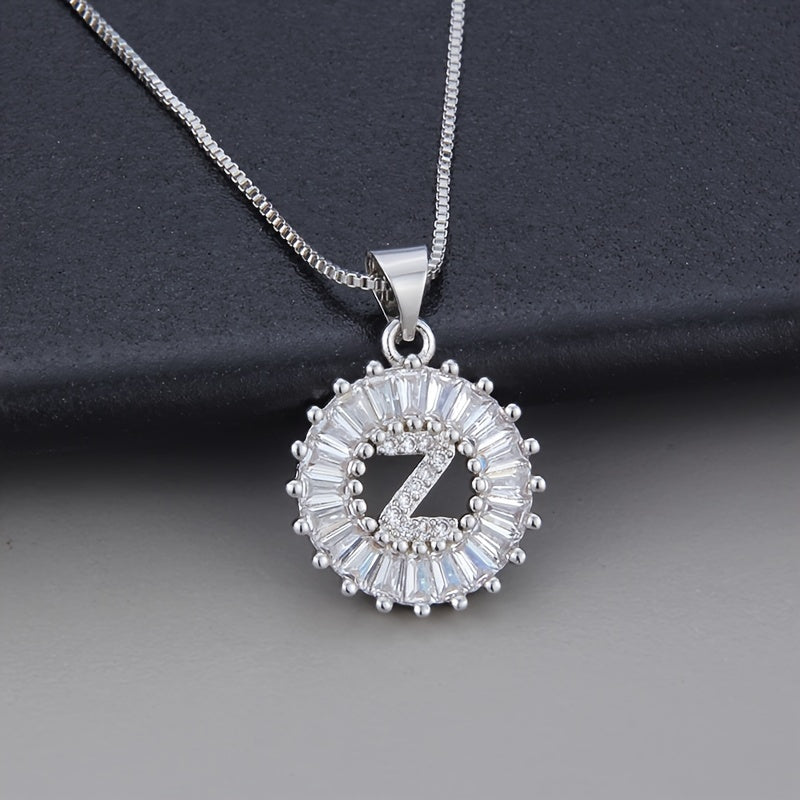Collier en zirconium avec lettre initiale en or blanc