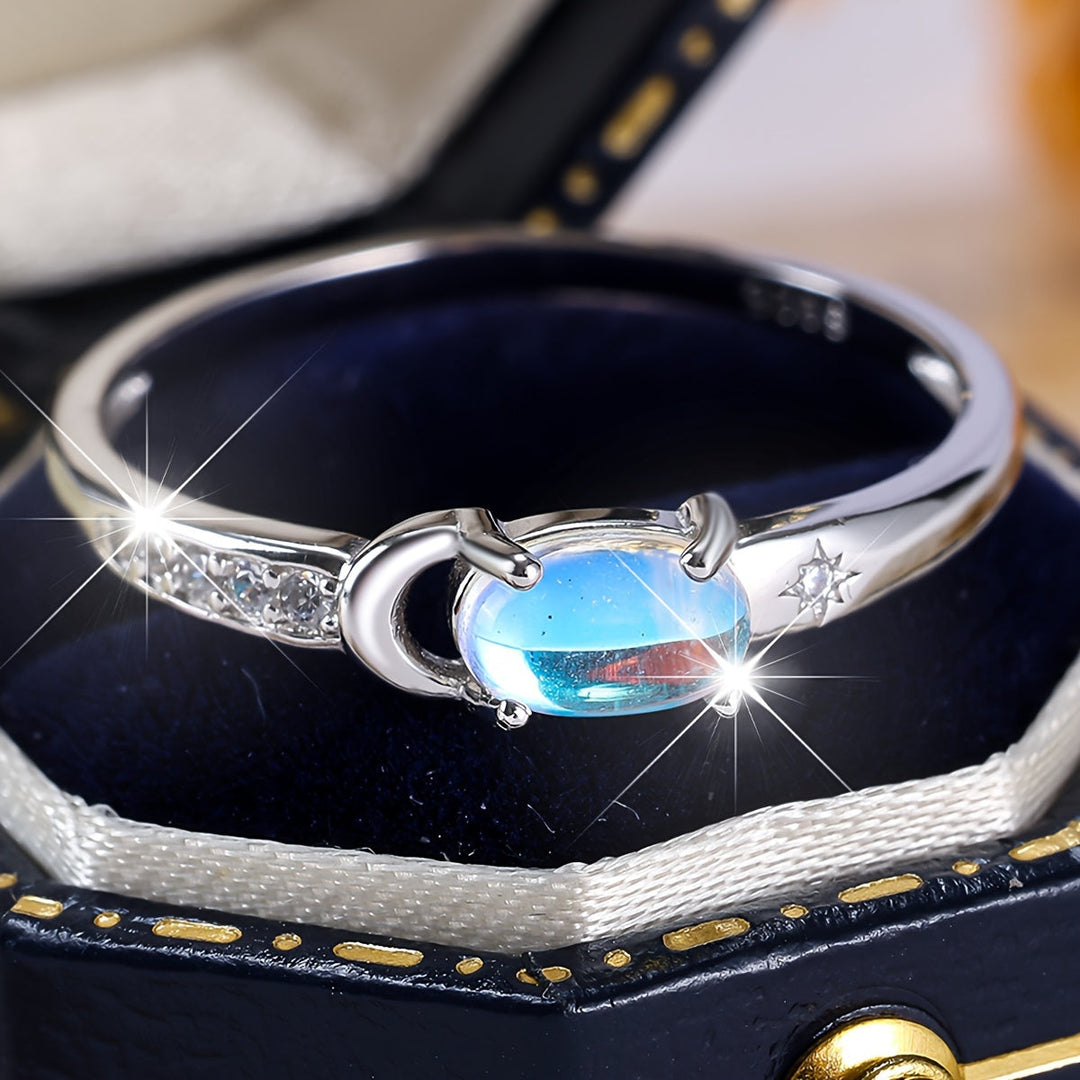 Bague en argent en forme de croissant avec pierre de lune