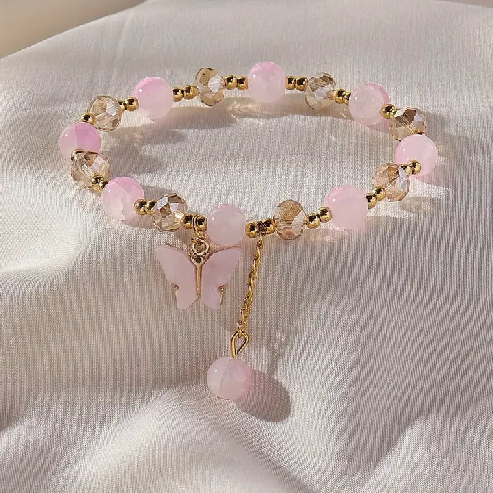 Bracelet Élastique en Perles avec un Magnifique Papillon