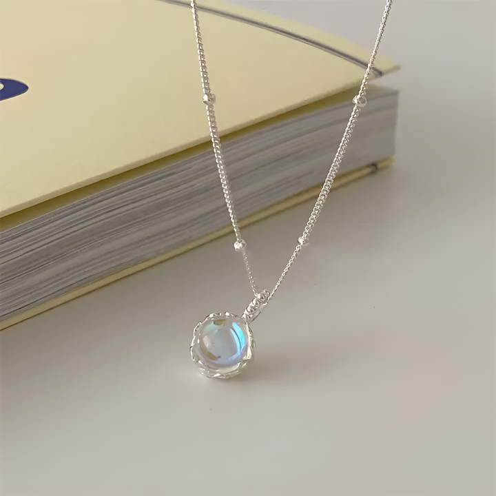 Pendentif en Pierre de Lune avec Monture Éclatante
