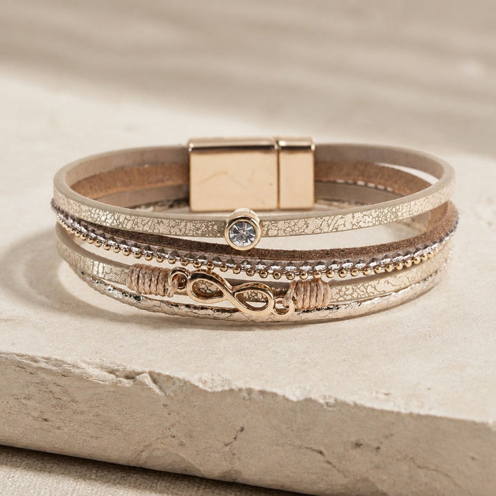 Bracelet en zirconium avec enveloppe en cuir