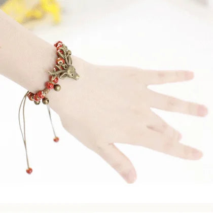 Bracelet en céramique fait main avec pendentif en forme de faon
