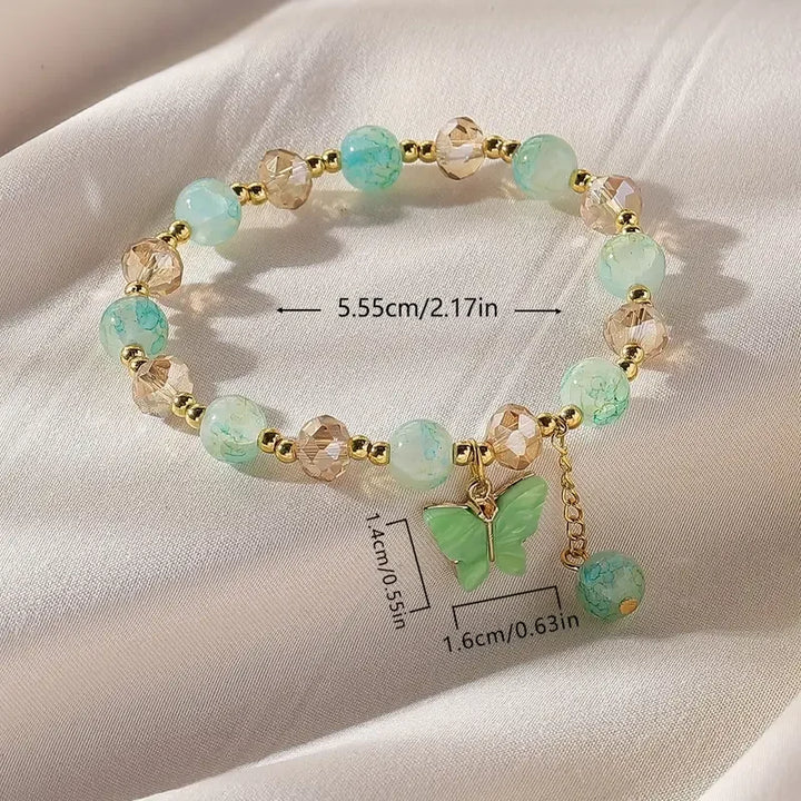 Bracelet Élastique en Perles avec un Magnifique Papillon