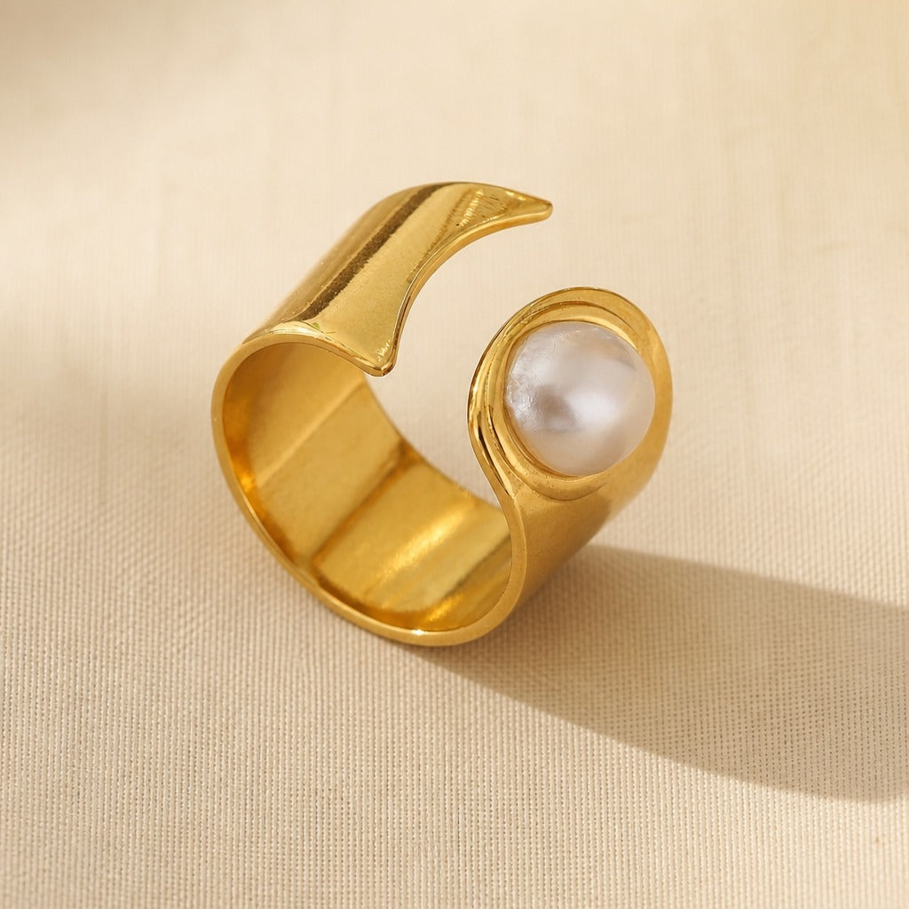 Bague ouverte en or avec perles