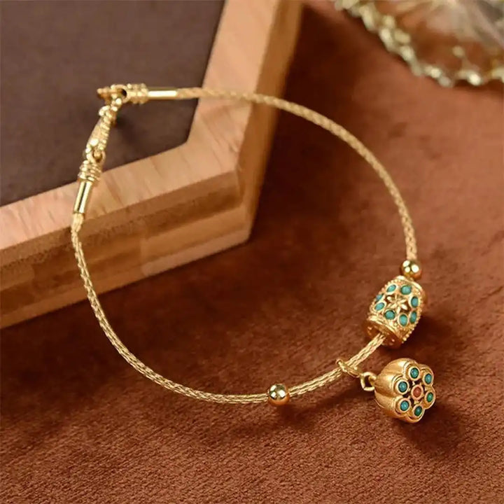 Bracelet en Or Antique avec Lotus Turquoise