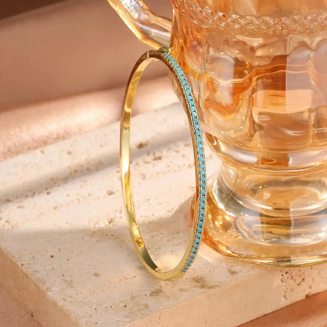 Bracelet en turquoise dorée