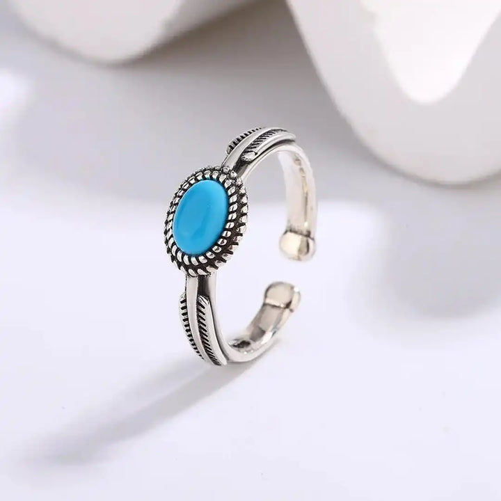 Bague Ajustable en Argent avec Plume et Turquoise