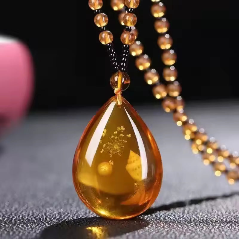 Collier en Ambre Floral Encastré