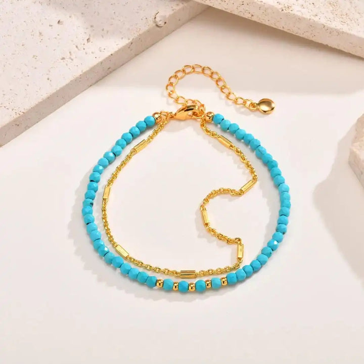 Bracelet en turquoise avec double chaîne en or éternel