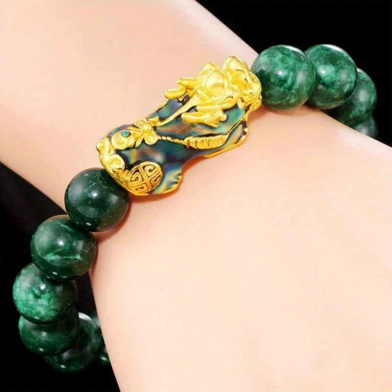 Bracelet en jade avec perles en or