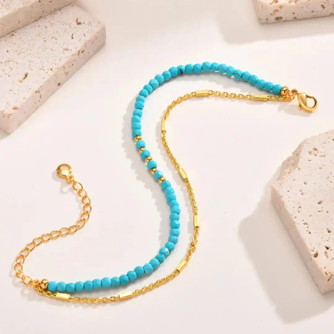 Bracelet en turquoise avec double chaîne en or éternel