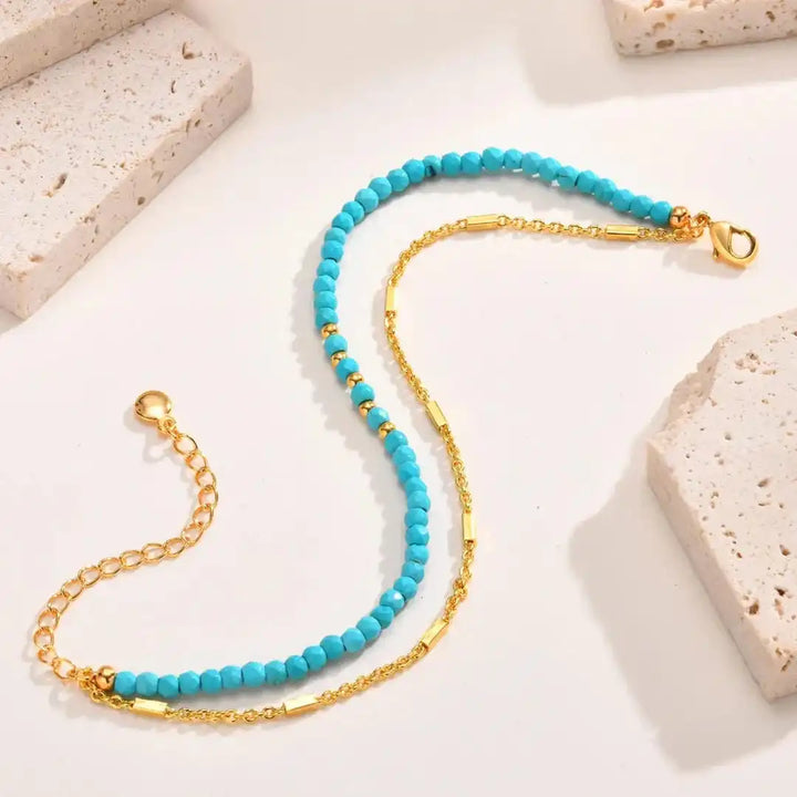 Bracelet en turquoise avec double chaîne en or éternel