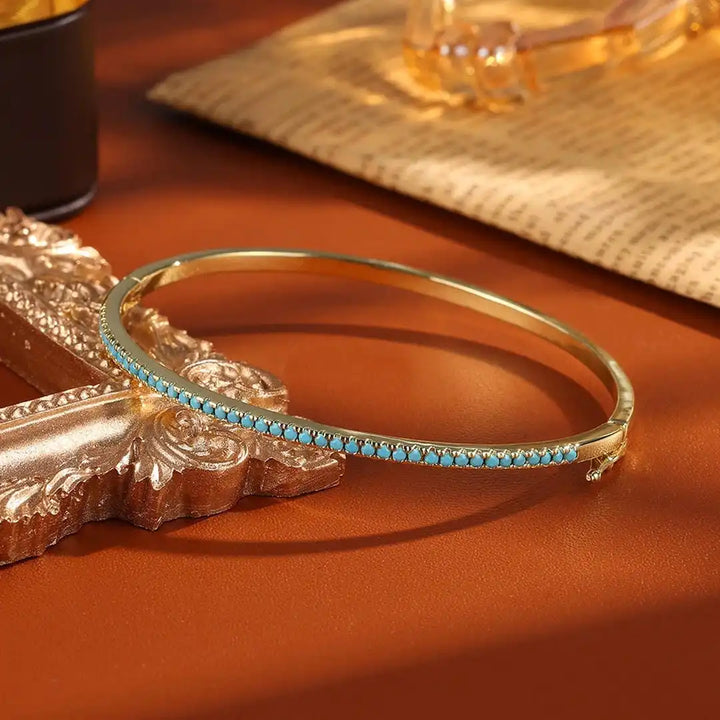 Bracelet en turquoise dorée