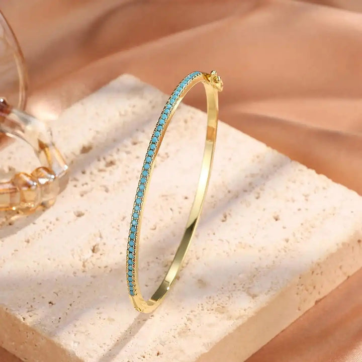 Bracelet en turquoise dorée