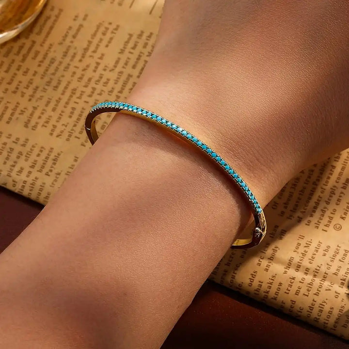 Bracelet en turquoise dorée