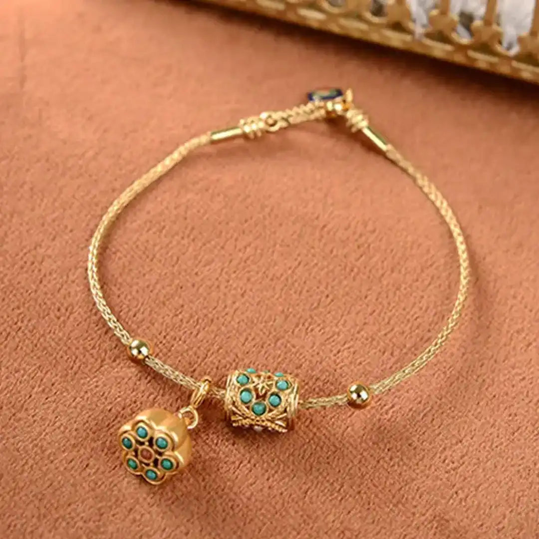 Bracelet en Or Antique avec Lotus et Turquoise