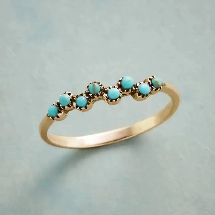 Bague intemporelle en perles turquoise