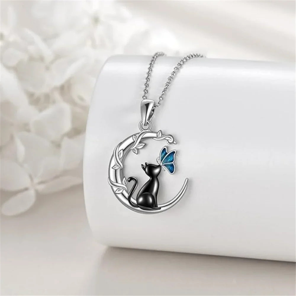 Collier Pendentif en Cristal de Lune et Papillon
