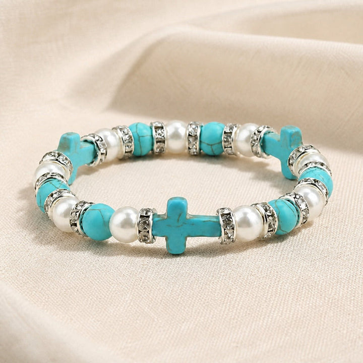 Bracelet en perles turquoise avec croix