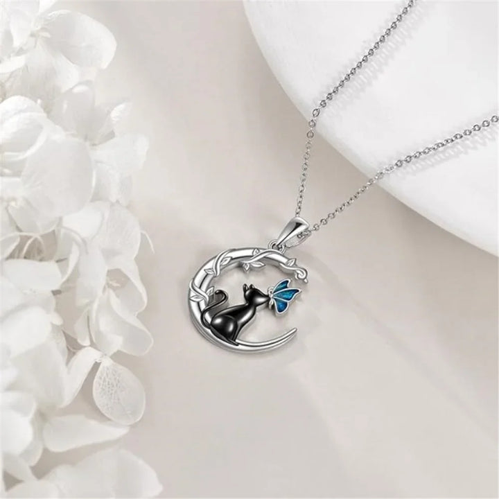 Collier Pendentif en Cristal de Lune et Papillon