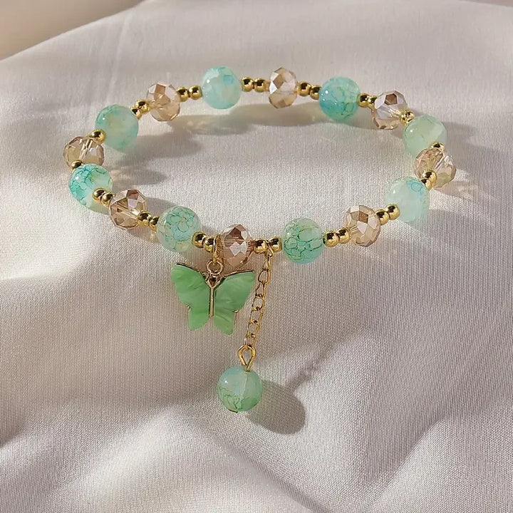 Bracelet Élastique en Perles avec un Magnifique Papillon