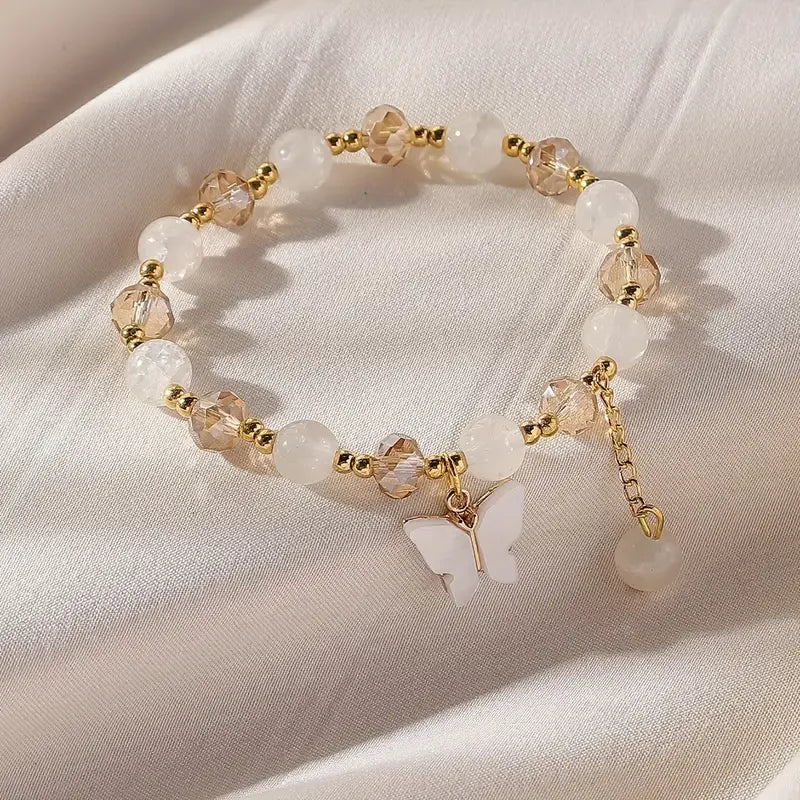 Bracelet Élastique en Perles avec un Magnifique Papillon