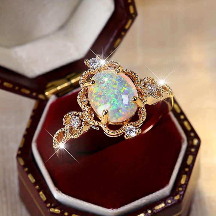 Bague Vintage en Or avec Opale et Halo