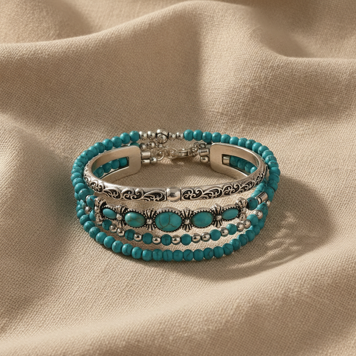 Ensemble de 5 bracelets en perles turquoise avec une volute en filigrane argenté
