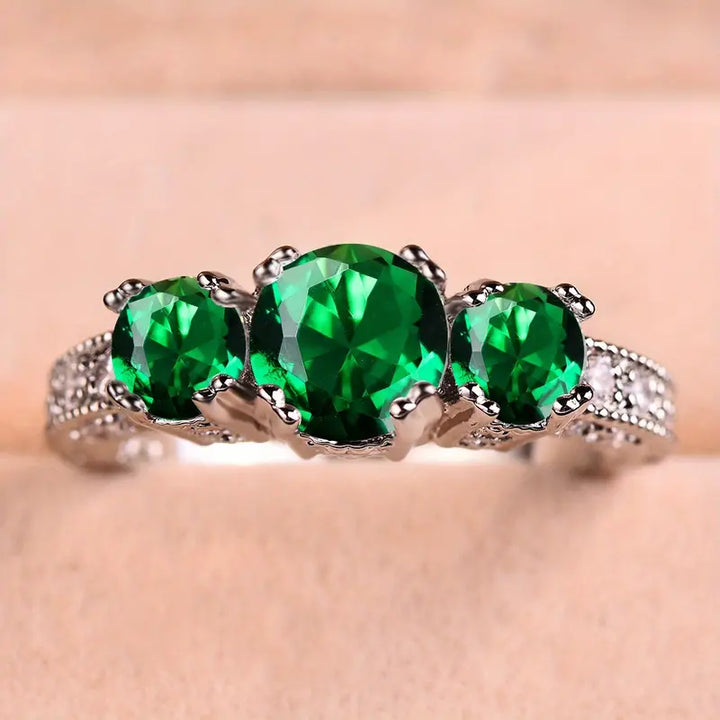 Timeless Ring with Sparkling Emeralds