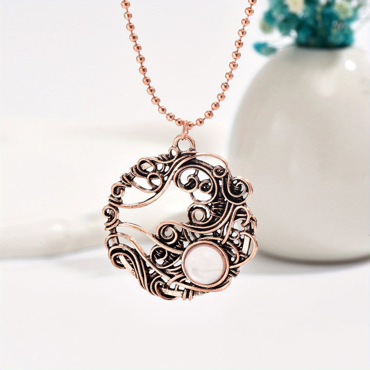 Pendentif circulaire en pierre de lune enroulé de fil