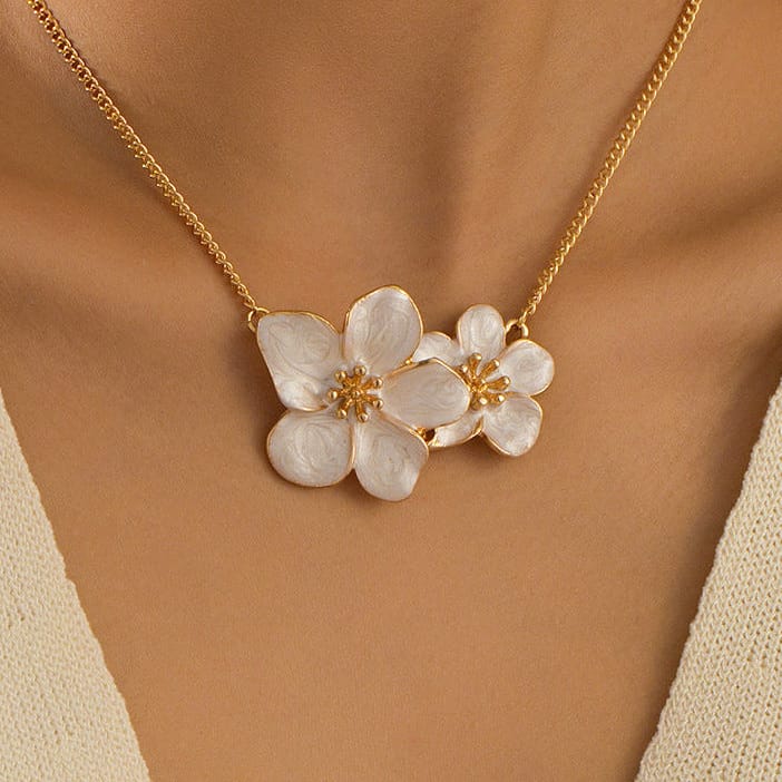 Collier avec pendentif en perle dorée