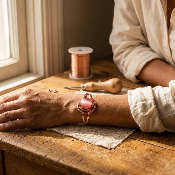 Bracelet en cuivre avec sphère rose éternelle