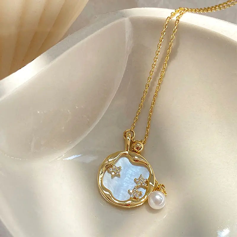 Collier en or avec pierre de lune et perle naturelle