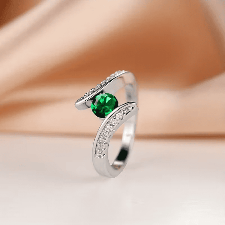 Bague Déclaration Émeraude Orbit Lumineux