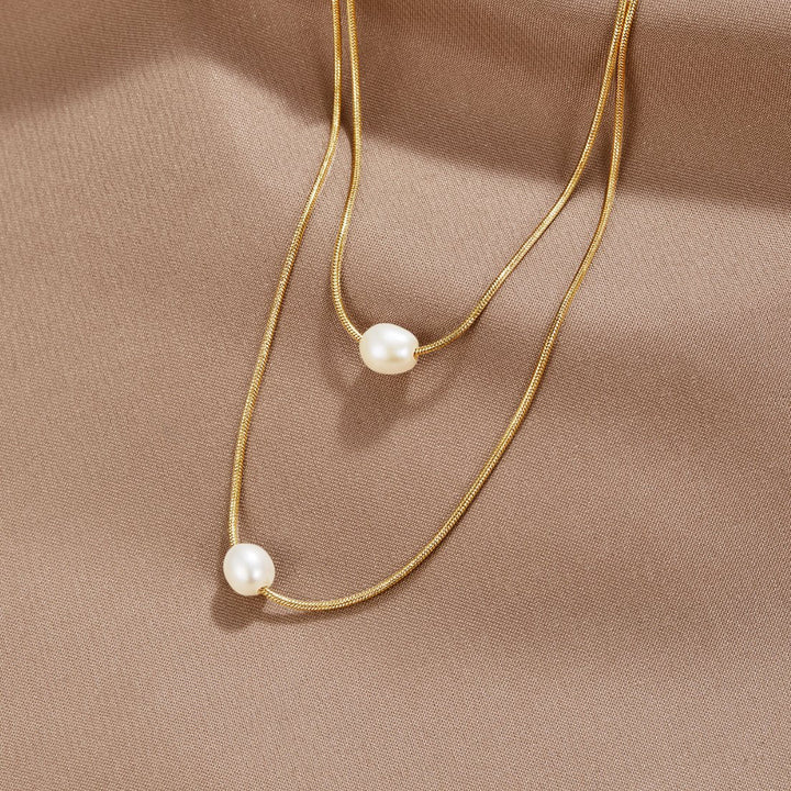 Collier de perles superposé sophistiqué