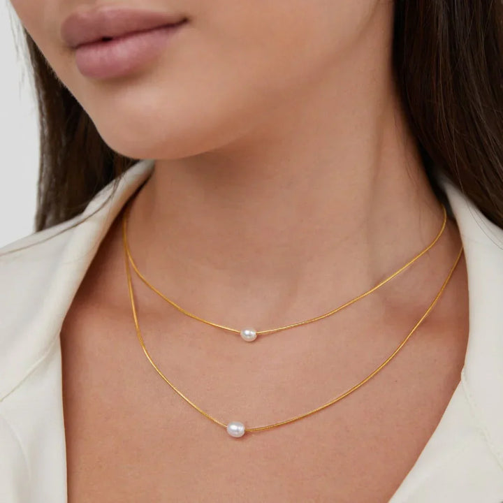 Collier de perles superposé sophistiqué