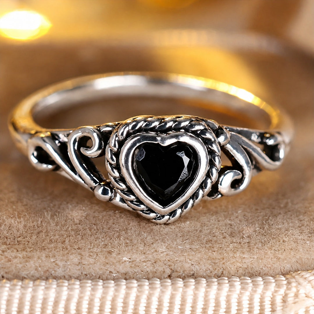 Bague en zirconium avec cœur en onyx
