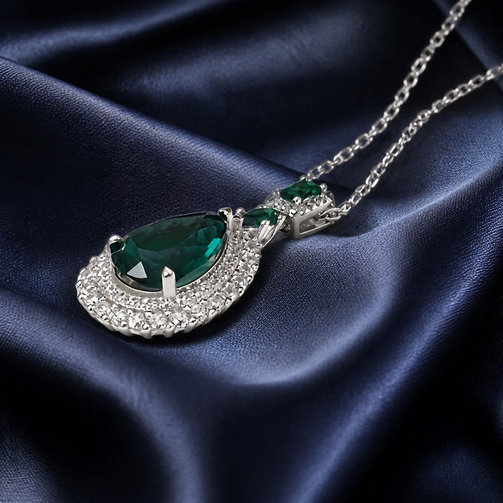 Collier en Or Blanc avec Émeraude Couture